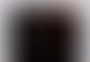 Mooni software website contact page in dark mode with 'Get in Touch' headline and contact info cards.